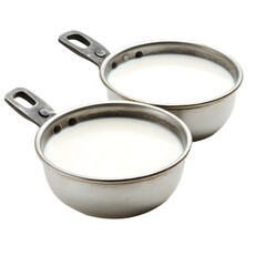 Fototapeta premium Fresh White Milk in Two Metal Pans - Professional Food Photography