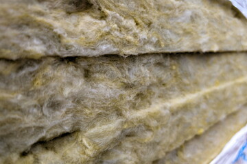Insulation material displayed in a construction setting highlighting its texture and composition during a home renovation project