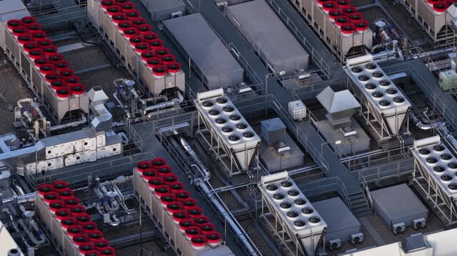 Cooling fans on top of a large scale data center, IT technology, Internet infrastructure. Cloud computing, AI en data technology.