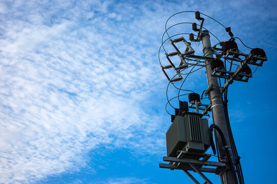 15kV power transformer on top of the electic pole. Local network of power supply.