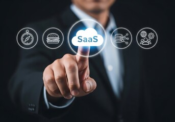 Businessman touches cloud software icons touching