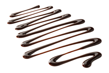 Drizzled chocolate syrup swirls isolated on transparent background