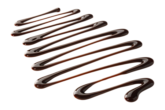 Drizzled chocolate syrup swirls isolated on transparent background