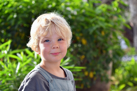 Smiling little Boy Portrait Outdoors  in summer