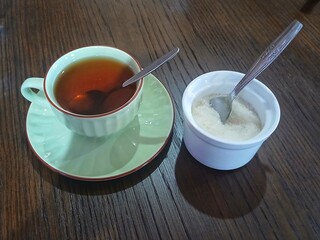 cup of tea with sweet sugar