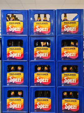 Kiel, Germany - 18. August 2025: Paulaner Spezi crates stacked in supermarket display
