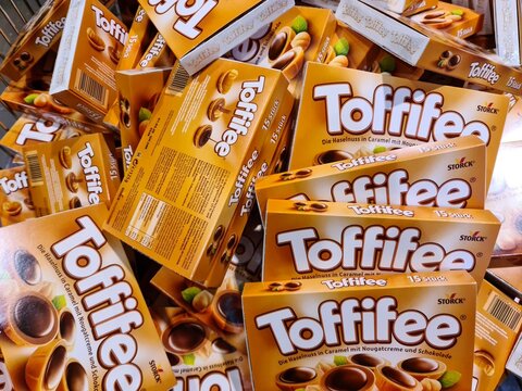 Kiel, Germany - 18. August 2025: Storck Toffifee hazelnut candies in caramel with nougat cream and chocolate filling