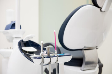 Closeup view of various dental tools in a modern clinic