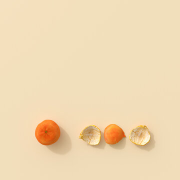 Mandarin fruit and peel arranged in a row on minimal background
