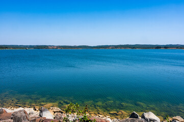 Fototapeta premium Barragem de Morgavel reservoir with clear blue water in Alentejo Portugal