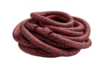 Coiled red and black climbing rope against black background