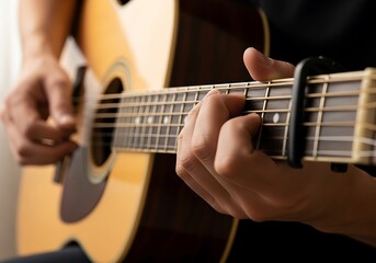 Fototapeta premium Close-up of a guitar player's hands, showcasing chord work and musical passion in progress