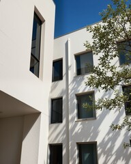 Fototapeta premium Modern Architectural Design with Natural Light and Shadow Play