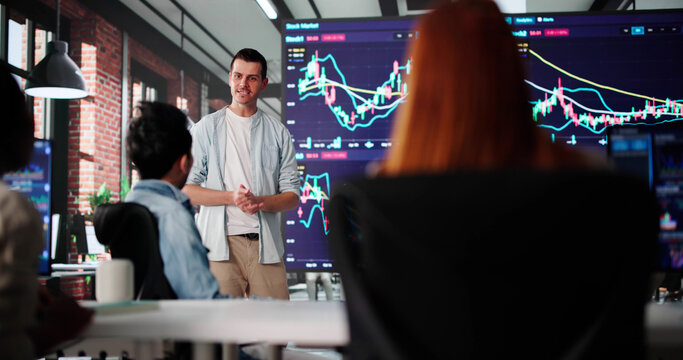 Man Presenting Stock Trading Training On TV