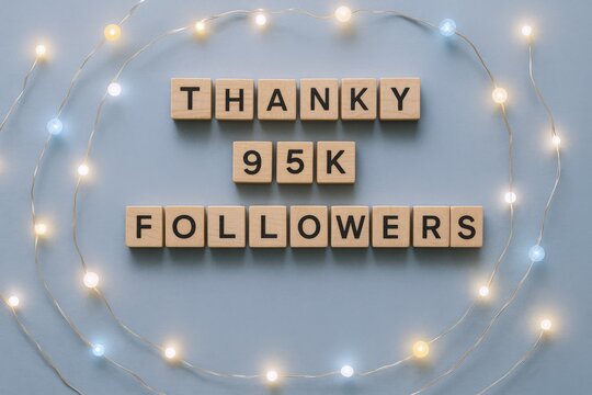 Celebrating 95K Followers: A Thank You Message with Decorative Lights on Blue Background, Minimalist Social Media Milestone - Powered by Adobe