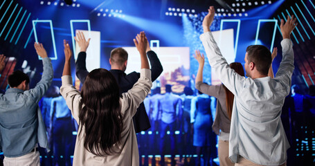 Diverse Christian Community Worships Happily With Raised Hands