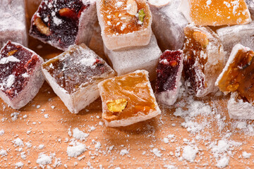 Sweet food Turkish delight, assorted rahat locum in form of cubes with nuts and powdered sugar, traditional food