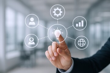 Digital Business Strategy: Hand Touching Light Bulb Icon Representing Innovation and Technological Solutions