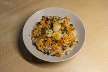 Mushroom risotto with scallop and crispy parmesan.