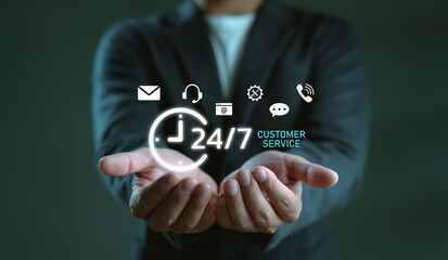 Businessman offering 24-7 customer service with communication icons. Concept of nonstop support, live chat, call center, helpdesk, online assistance, customer experience and business service.