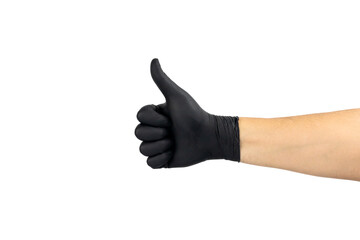 Hand in a black glove showing a thumbs-up gesture. Sign of approval, success, or agreement, isolated on white background with clipping path.