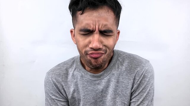 Man Showing Disappointment and Sadness.