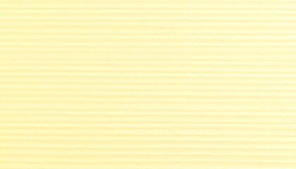 Fototapeta premium A soft, pale yellow surface exhibits regular, horizontal, ribbed lines.