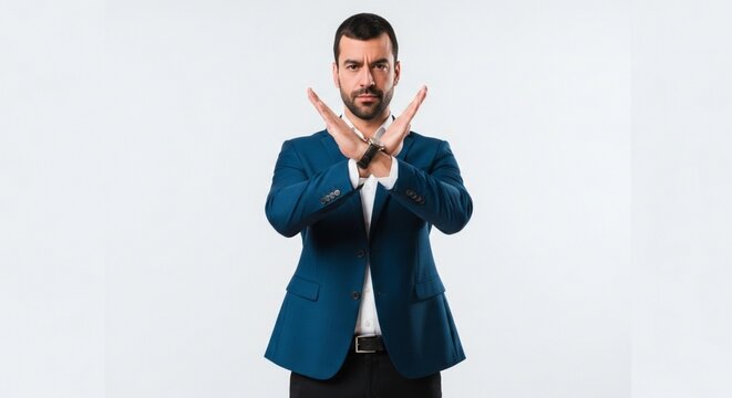 Businessman Showing Stop Gesture with Crossed Arms.