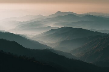 Discover the breathtaking beauty of mist-covered mountains with layers of rolling hills at sunset perfect for serene nature escapades and captivating photography.