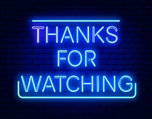Neon sign, thanks for watching, blue light on dark brick wall