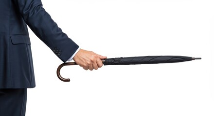 A man in a suit is holding an umbrella.