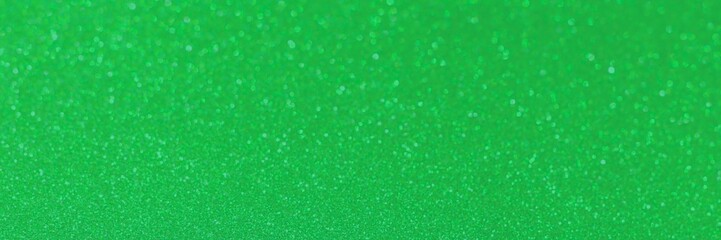 Green glitter bokeh circle glow blurred and blur abstract. Glittering shimmer bright luxury