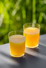 two glasses of orange juice