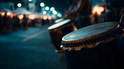 Obraz premium Taiko drums in a vibrant Japanese festival parade at night