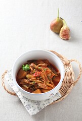 Spicy braised oyster mushrooms, a rustic Korean dish with rich sauce and vegetables prepared by master chef Hanshunseop.