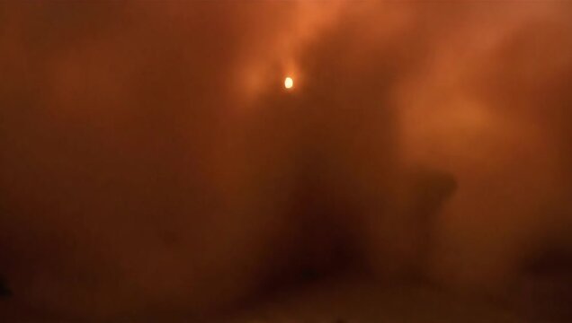 Epic Dust Storm Swirls Over Desolate Desert Landscape Video.