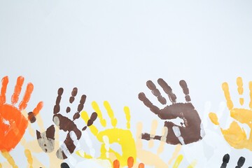 Tolerance concept. Colorful handprints on white background, flat lay. Space for text