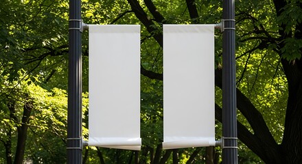 Blank vertical banners hanging on a lamp post amidst green foliage outdoor space