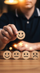 Smiling face icon customer satisfaction positive feedback five star rating wooden blocks hand service evaluation happiness review concept emotional expression