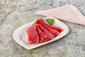 Raw red tuna sashimi slices