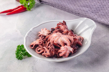 Marinated canned mini baby octopus