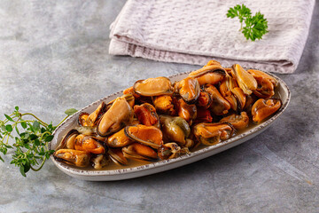 Peeled mussels heap in the bowl