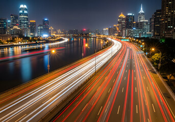 Obraz premium Night City Highway Traffic with Light Trails and River