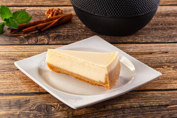 Classic delicous cheesecake slice served mint