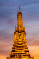 Twilight view of Wat Arun Ratchawararam Ratchawaramahawihan at sunset in bangkok Thailand. Landmark of Along the Chao Phraya River Thailand