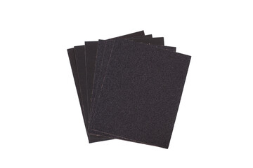Sheets of black sandpapers isolated on a white background