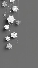 A beautiful winter landscape features fluffy snow-covered trees and delicate snowflakes falling gently, evoking a serene atmosphere