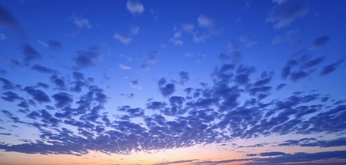 Obraz premium Vast, serene, twilight blue sky, scattered clouds, clear, bright