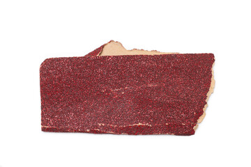 A piece of a used sheet of red sandpaper isolated on a white background