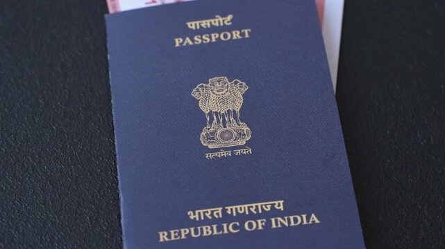Indian passport and tickets for travelling, flying and doing business. India document, id for crossing the border
